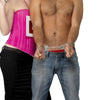 Plastic hand cuffs worn by a man in jeans, next to a woman dressed for a hen party.