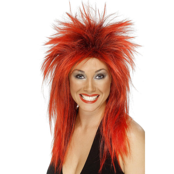 Woman with a vibrant red spiky wig on a white background