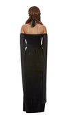 Back of a woman in a black Renaissance evening gown on a white background