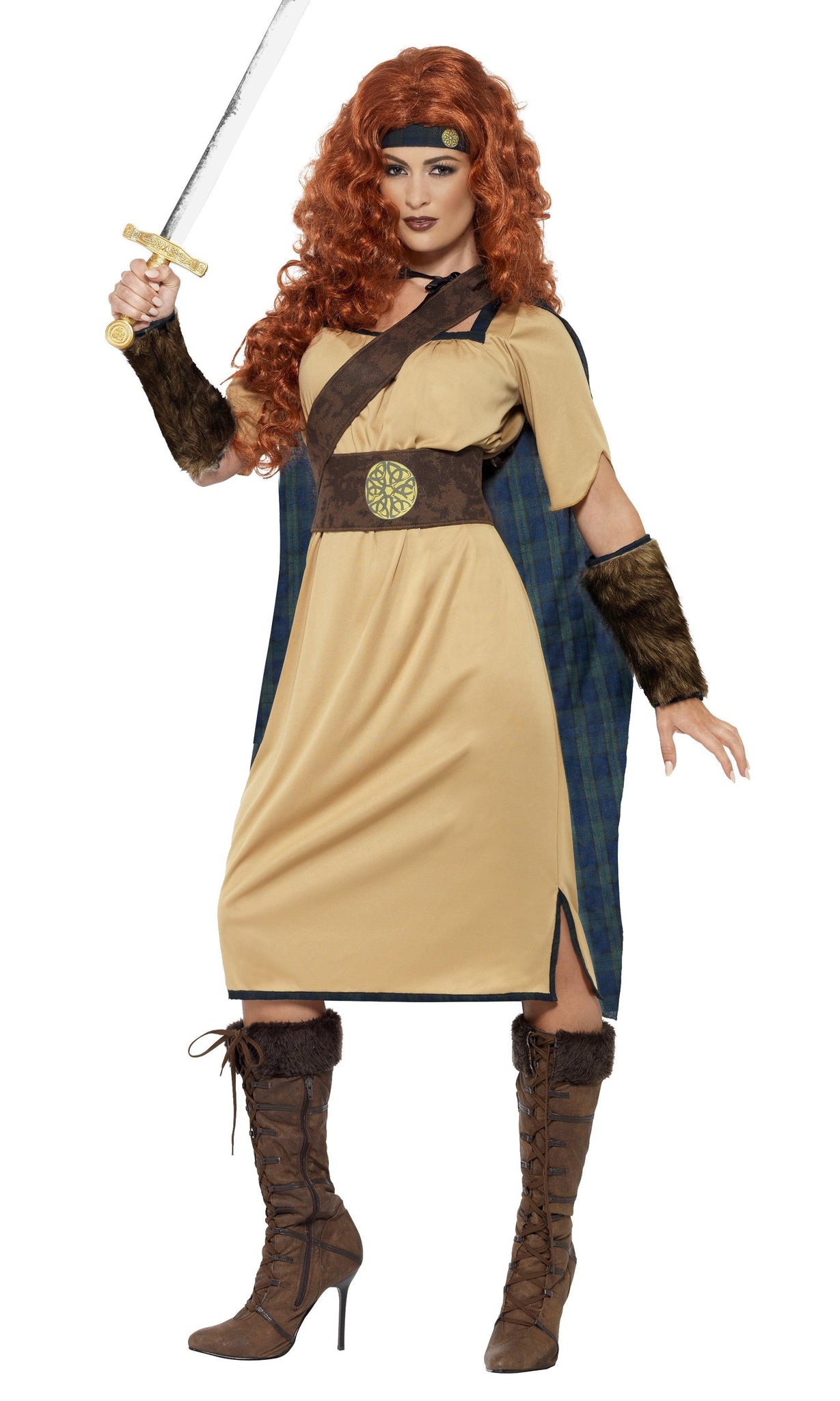 A woman modeling a Scottish warrior costume with a beige dress, brown belt, headband, and arm cuffs, holding a sword.