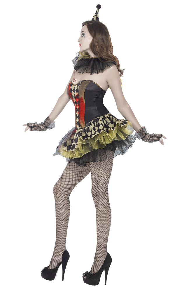 Side view of a woman in a zombie style short harlequin clown dress with matching hat
