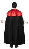 Back of vampire costume with red vest, cravat, medallion and cape