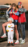 Woman's Marty McFly costume standing next to family and car