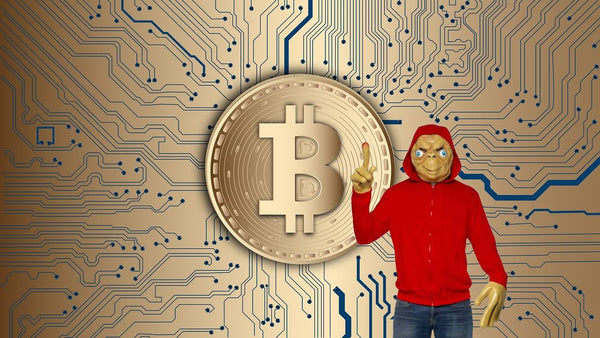 E.T. costume pointing to Bitcoin cryptocurrency showing Party Dudes now accepts it as payment