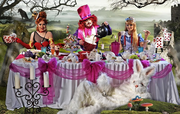 People dressed in costumes for the Mad Hatters tea party