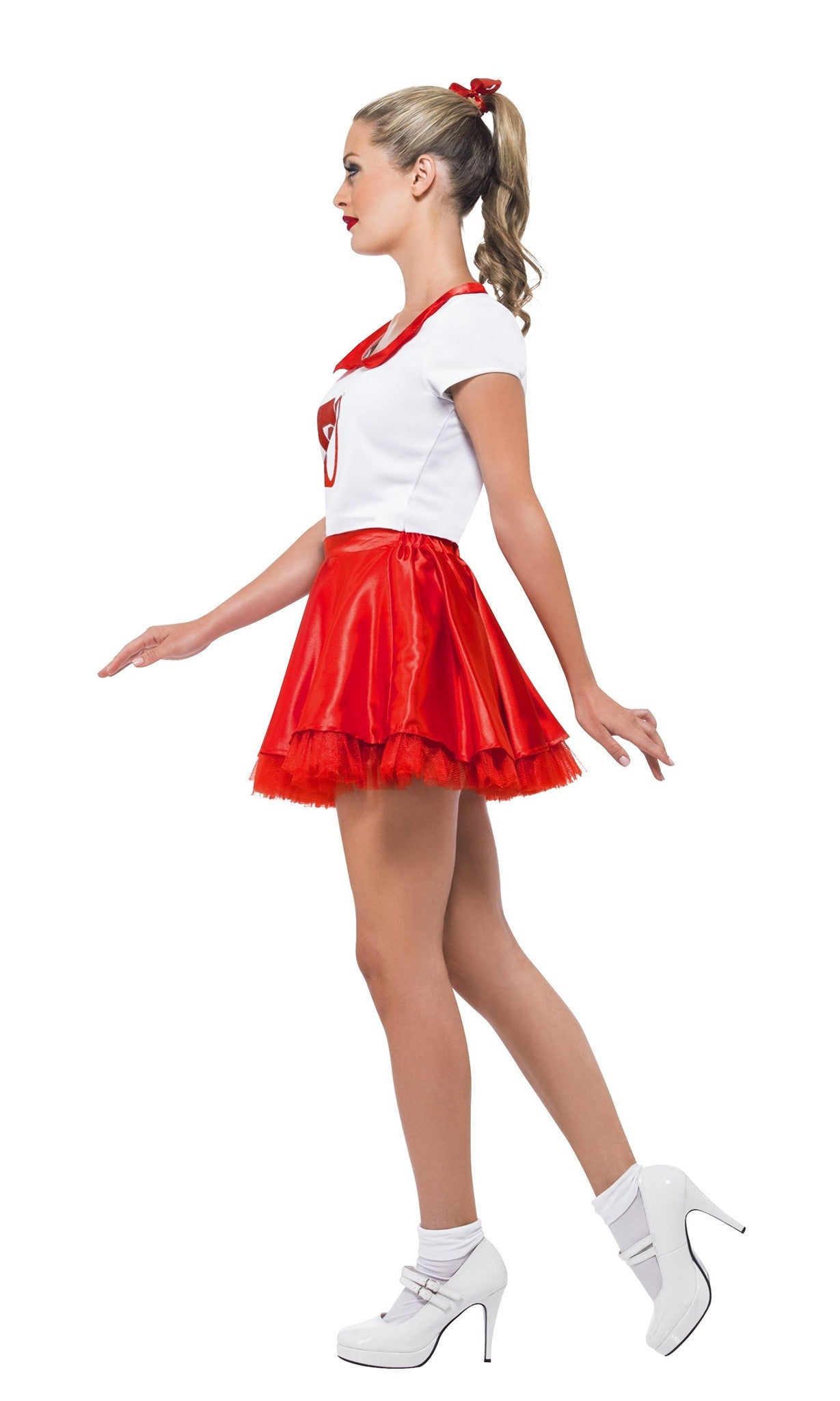 Woman wearing a red and white costume with a skirt on a white background