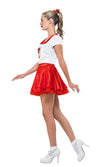 Woman wearing a red and white costume with a skirt on a white background