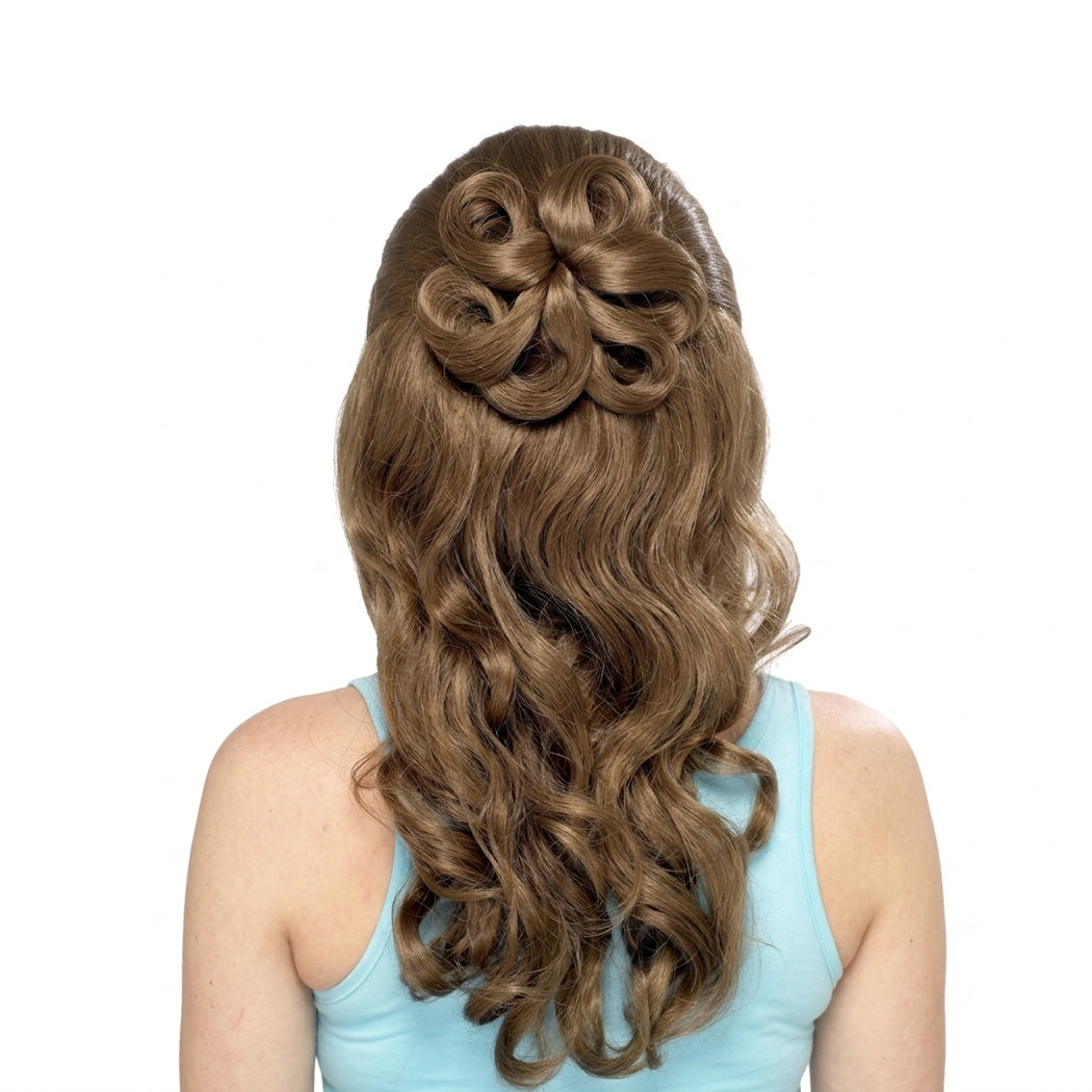 Woman with styled hair bun and long wavy hair
