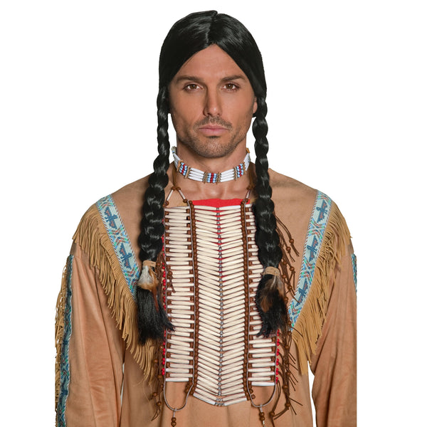 A man wearing a Native American Indian breastplate with braided tassels and beadwork, dressed in a costume resembling a squaw.