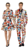 A man and a woman modeling matching comic-book style costumes. The woman wears a short white dress with a colorful pop-art print, and the man wears a matching suit with the same print over a black shirt and tie.