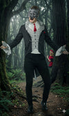 A man in a suit with a wolf mask standing in a forest