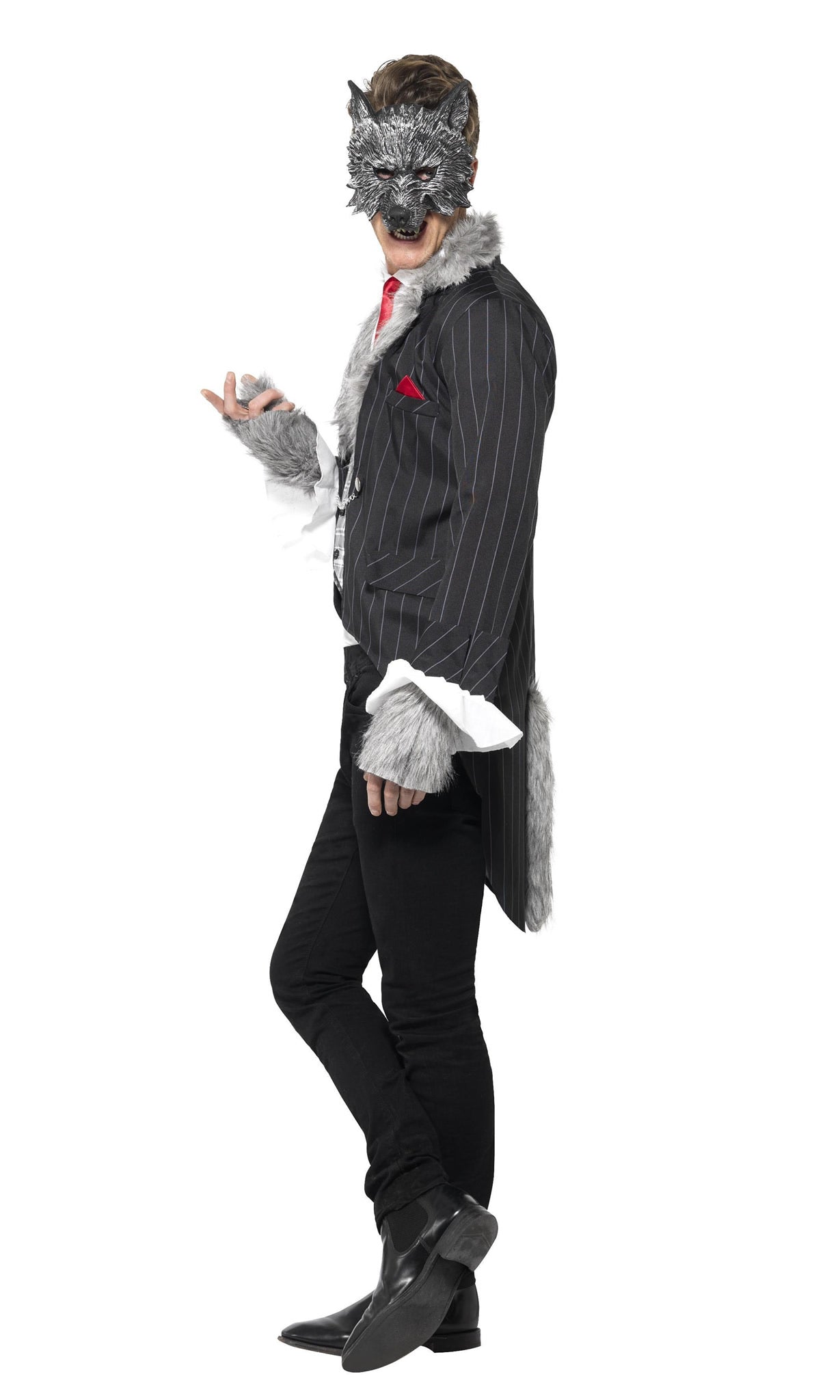 Side view of a man wearing a wolf costume with a suit and mask