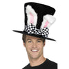 Person wearing a black top hat with bunny ears and a checkered bow tie