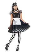 Woman wearing a black and white maid costume with checkered stockings on a white background