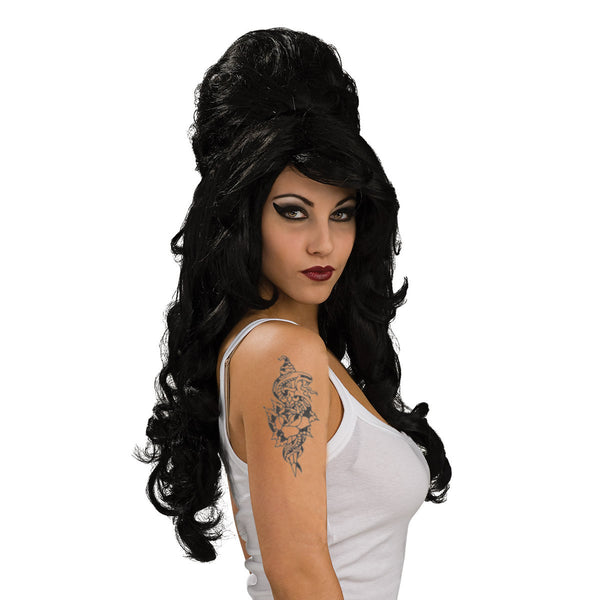 Woman with a black Amy Winehouse wig styled in an updo, wearing a white top