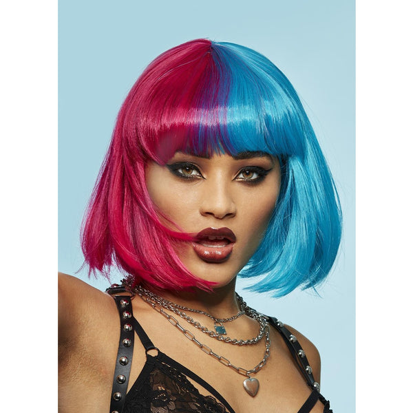Woman with a colorful pink and blue wig on a light blue background