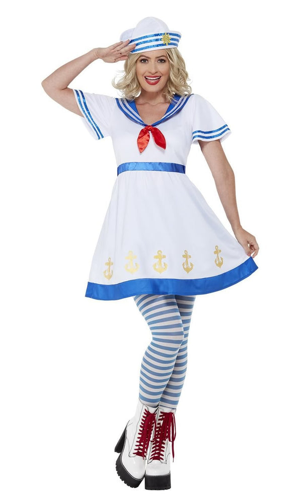 Woman wearing a sailor costume with a white dress, blue trim, and striped stockings on a white background.