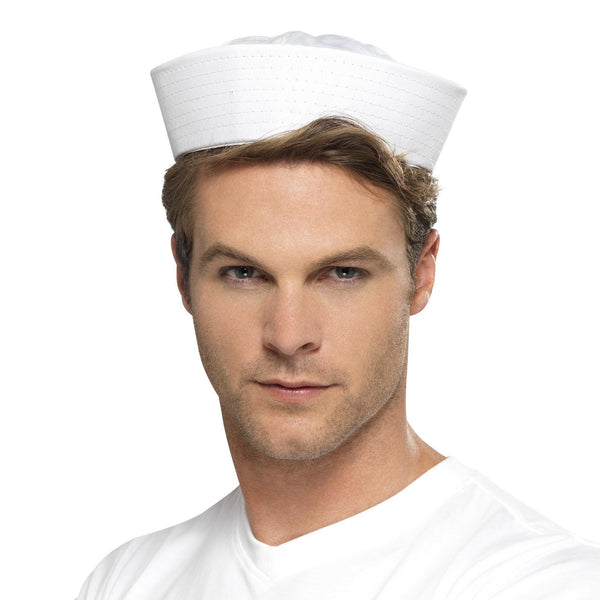 Man wearing a white sailor hat on a white background