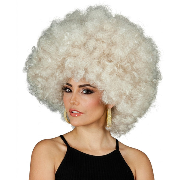 Woman wearing a large blonde afro wig