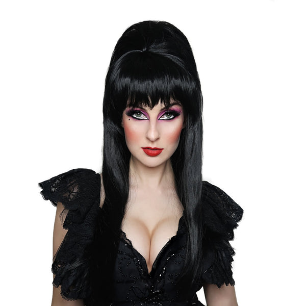 A woman wearing a long black Elvira style wig