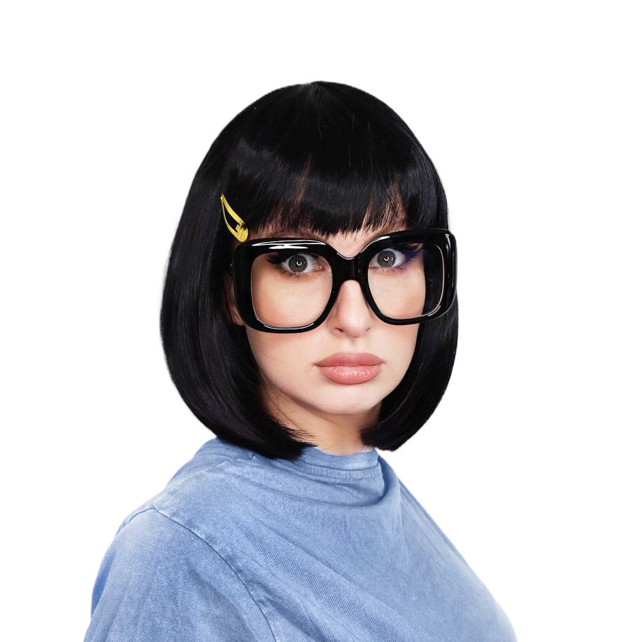 Woman with a black bob wig suitable for Tina Belcher and glasse, wearing a blue shirt and yellow hair clip