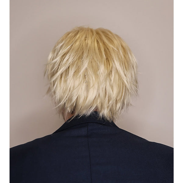 Person wearing a blonde wig from behind