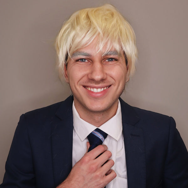 Person wearing a blonde wig and formal attire