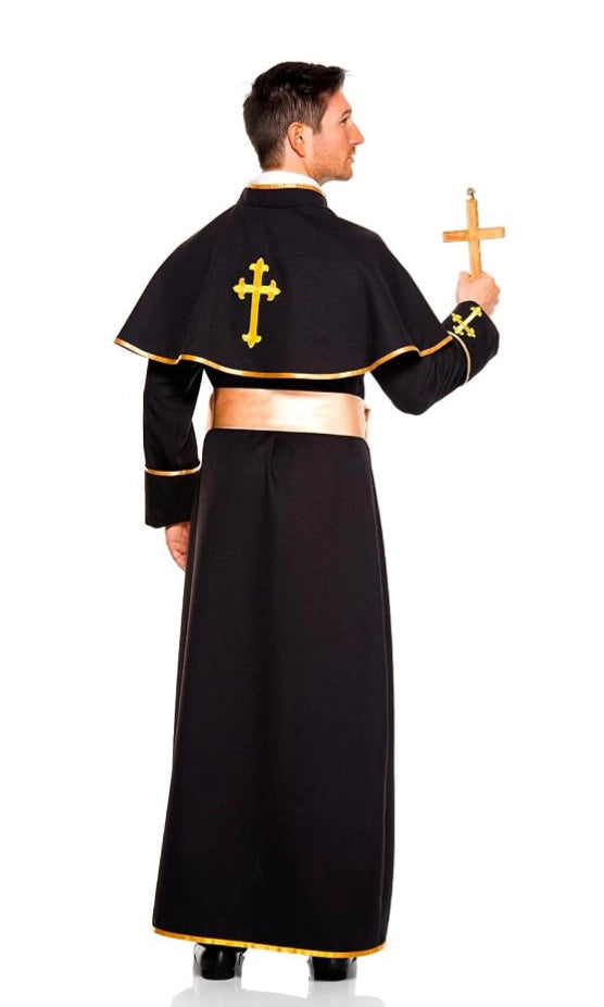 A man wearing a black priest costume with gold trim and a gold cross on the back, holding a small wooden cross.