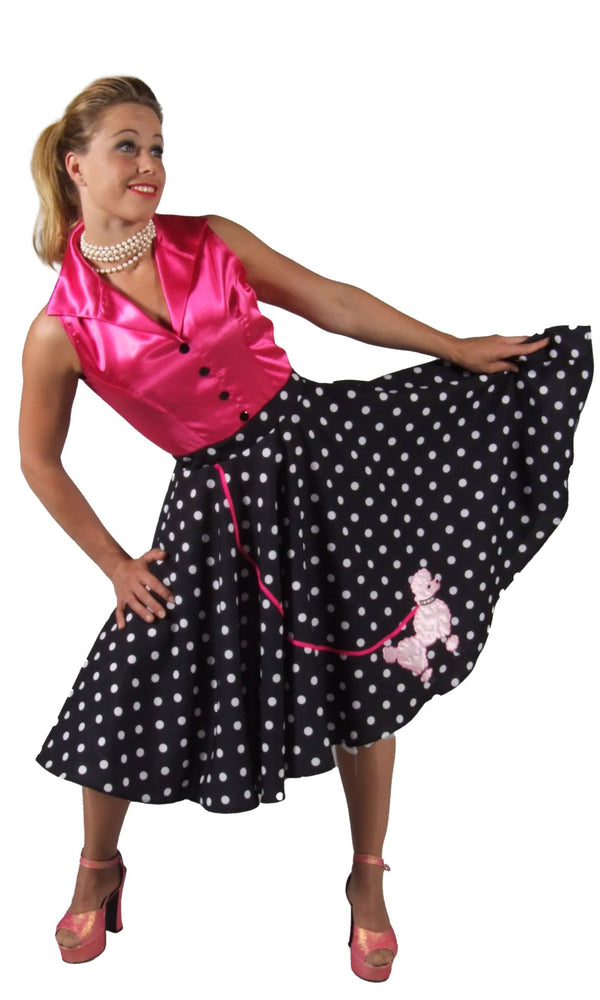 1950s rock n roll dress with pink upper and polka dot lower with poodle motif