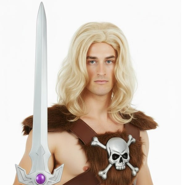 A man wearing a blonde warrior costume wig and brown fur-trimmed top with a silver skull-and-crossbones chest piece, holding a large silver sword.