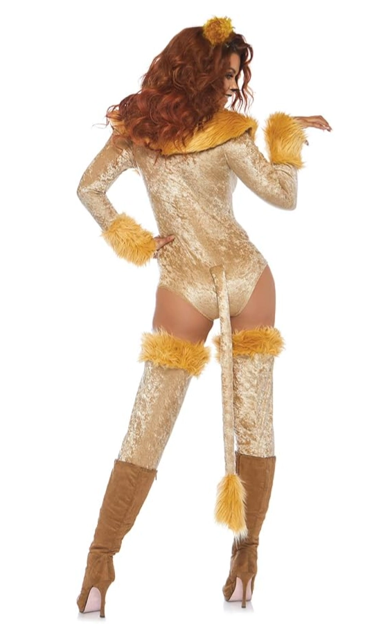 A woman modeling a gold and brown lion costume with faux fur trim, matching thigh-high stockings, a long tail, and tall heeled boots.