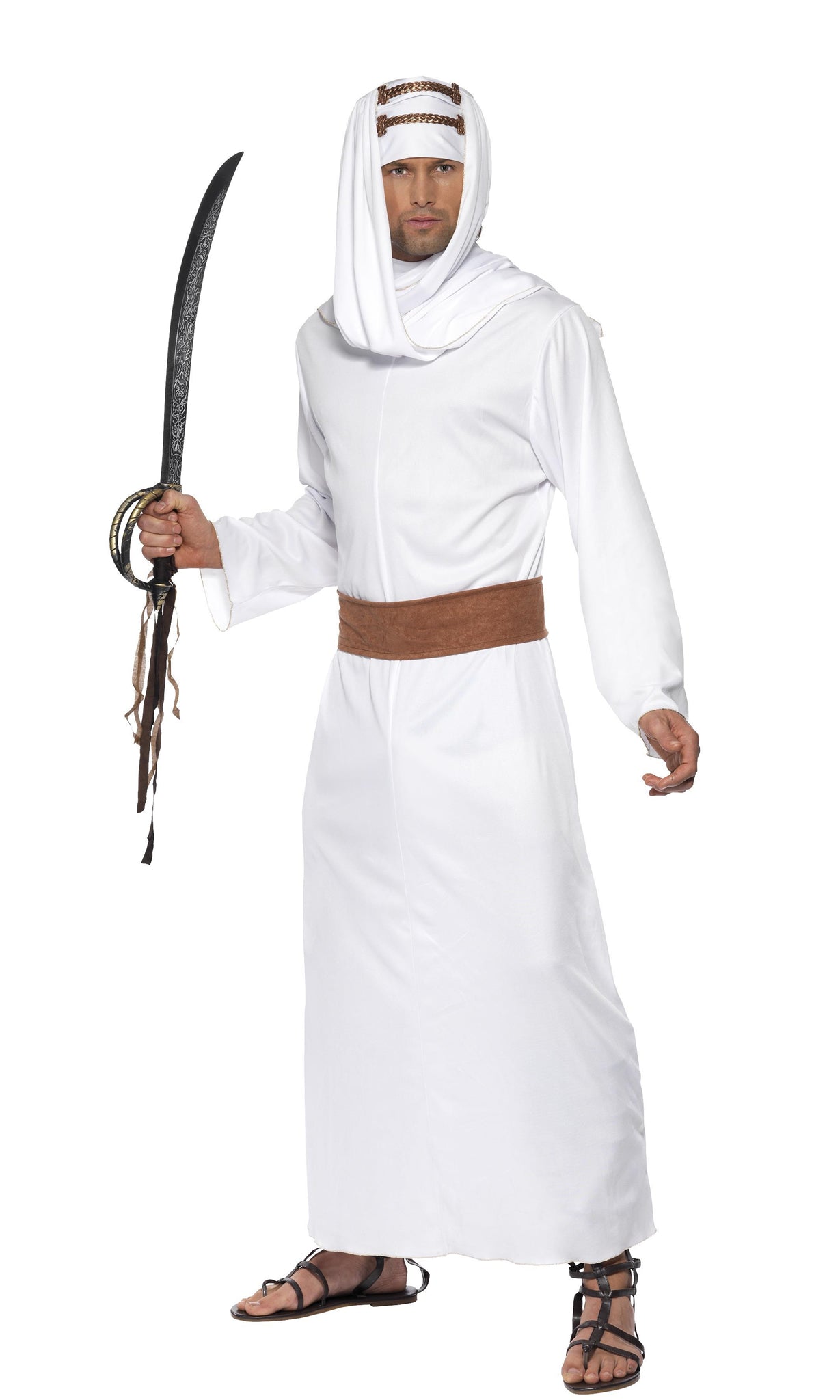 A man wearing a white Arabian costume with a belt and headpiece, holding a sword, suitable for portraying T. E. Lawrence.