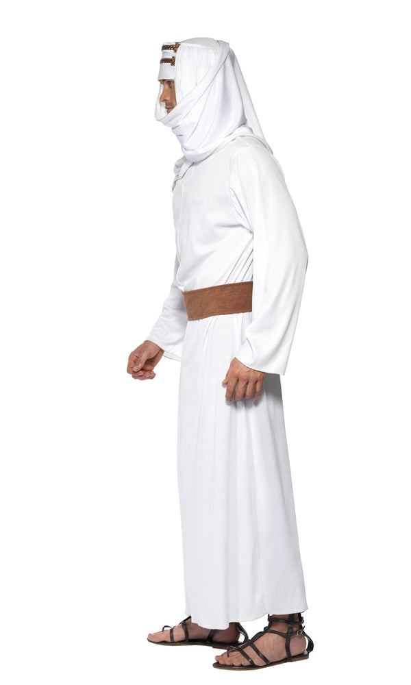 Side of a man wearing a white Arabian costume with a belt and headpiece, suitable for portraying T. E. Lawrence.