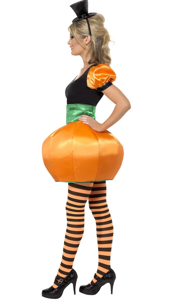 Side of orange pumpkin skirt and top with green cummerbund