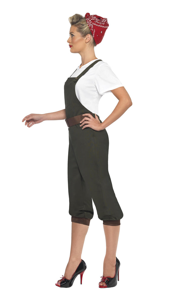 Side of WW2 era land girl costume in green dungarees, white top and red head scarf
