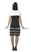 Back of black flapper dress with silver trim, white fur stole and black headband