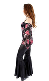 Side of black 70s costume with flare pants and pink flowers