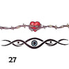 Temporary tattoo of a heart tied with barbed wire and another swirl pattern tattoo