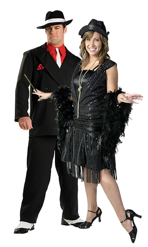 Jazz flapper 1920s costume with tassels and hat, standing next to male gangster