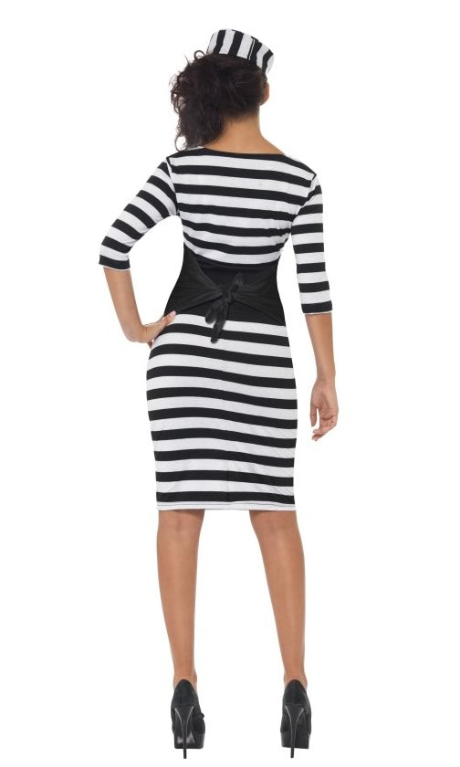 Back of black and white convict dress with waist cincher belt and hat