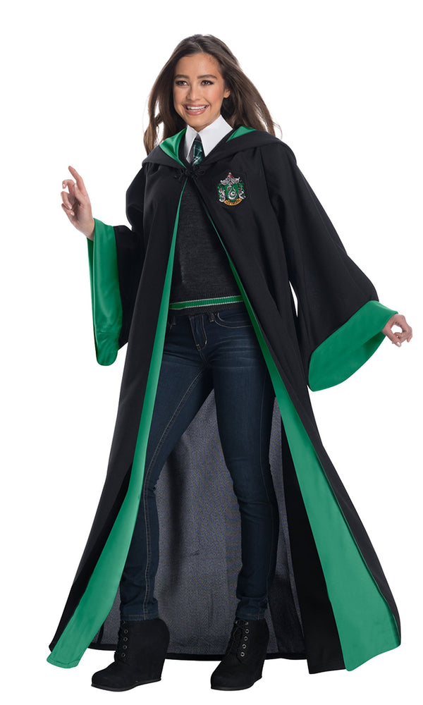 Woman wearing green and black Slytherin costume with robe, sweater and tie