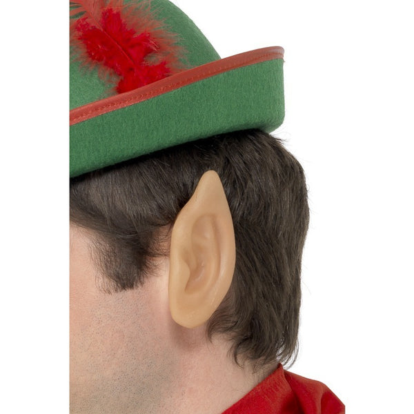 Soft vinyl elf ears worn by man with a green elf hat