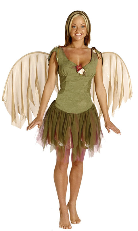 A woman wearing a green fairy costume with wings
