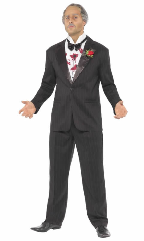 A man wearing a gangster suit with bullet wounds