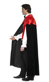Side of vampire costume with red vest, cravat, medallion and cape