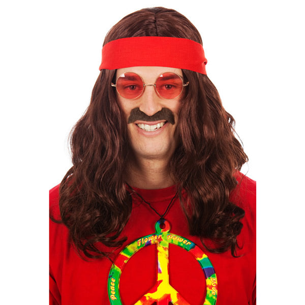 Long brown unisex 60s hippy wig with red headband worn by a man