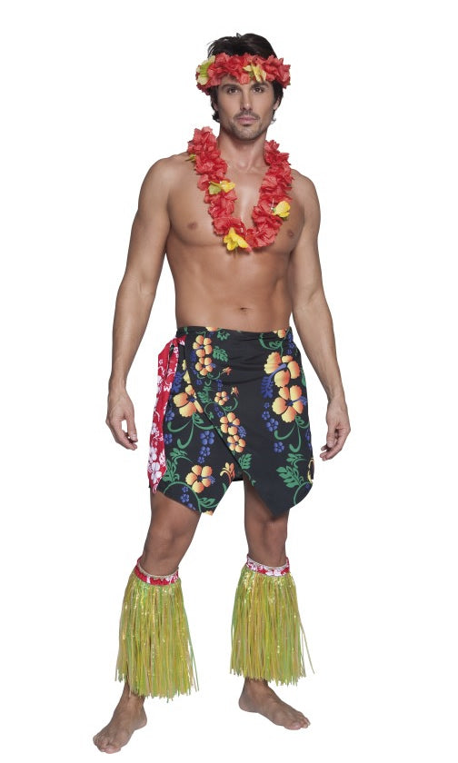 A man wearing a black Hawaiian sarong with a red leia and tassel ankle cuffs