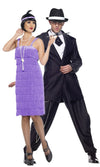 Lilac knee length flapper dress with tassels on front  and headband, next to partner