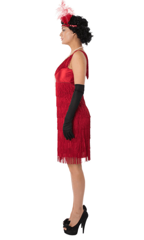 Side of short red flapper dress with tassels and red headband